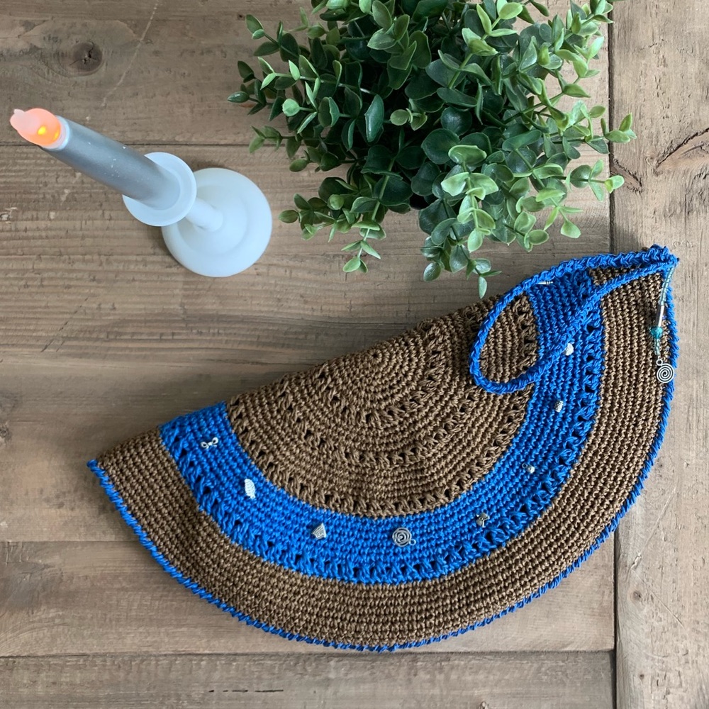 Blue and brown woven raffia half round clutch